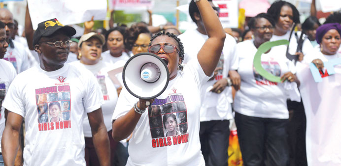 Activists during a protest for the release of the abducted school girls in Lagos yesterday.