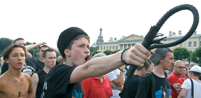  An anti-gay protester shouts slogans as he tries to break up a Gay Pride event in Saint Petersburg.