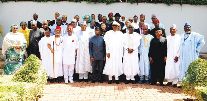 Nigerian President Mohammadu Buhari with newly-appointed ministers after the swearing in ceremony in Abuja yesterday.