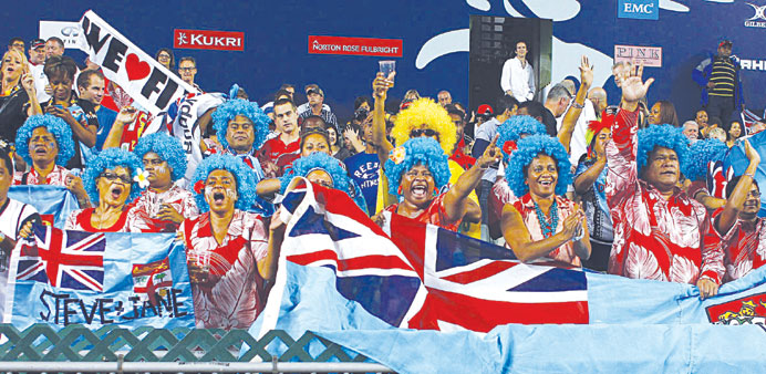 Supporters of Fiji cheer on their team on day one of the three-day Hong Kong Sevens rugby yesterday. (Reuters)