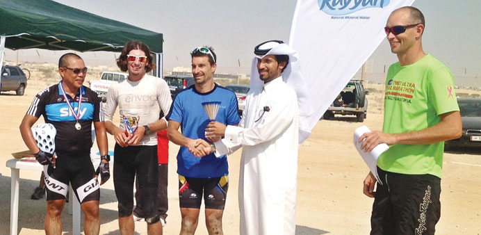 Farhan al-Sayed leads the awarding ceremony in one of the bike races recently.