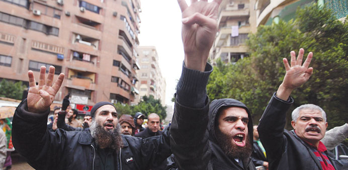 Supporters of Mursi protest in Cairo yesterday