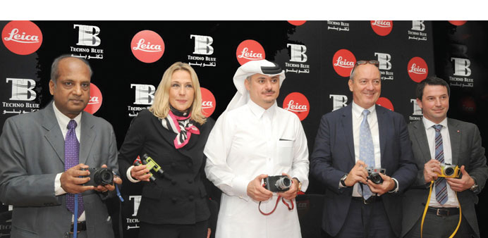 Nabil Abu Issa flanked by Srinivasan, Andrea Von Gyimes, Alfred Schopf, and Falk Friedrich at the launch of Leica products in Qatar.