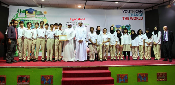 Officials with some students.