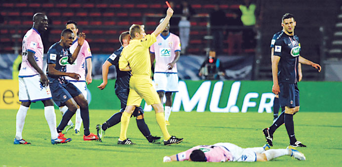 Paris Saint-Germainu2019s Thiago Motta (right) receives a red card during their French Cup football match against Evian in Annecy, eastern France, on Wedn