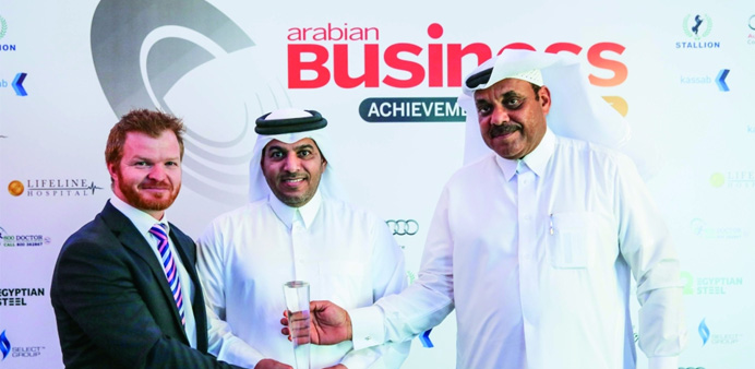  tAli Abdulla al-Khater, centre, receiving the award.