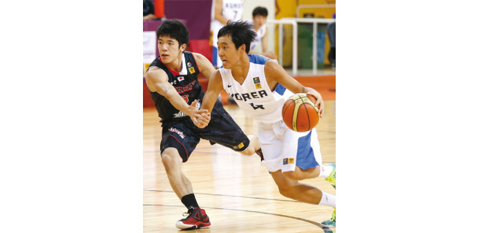 Action from the Korea-Japan match. PicTURES: Jayaram