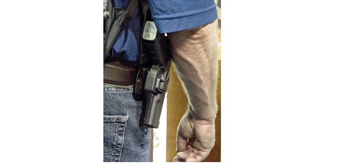 A federal judge has ruled that a ban on citizens carrying handguns in public in the US capital Washington DC is unconstitutional.