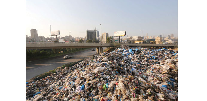 A pile of garbage is seen in an area of Beirut yesterday. 