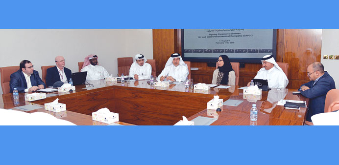 QU and Qapco officials at the agreement signing ceremony