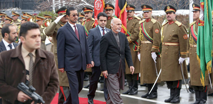 Afghan President Ashraf Ghani inspects a guard of honour during the inauguration ceremony of the new session of parliament in Kabul.