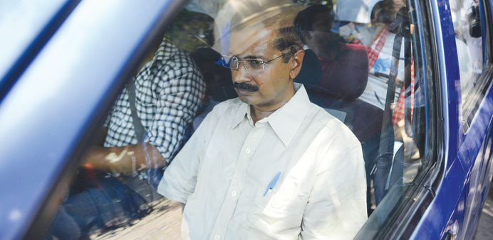 Aam Admi Party leader Arvind Kejriwal is seen outside a courthouse in New Delhi yesterday. The court sent him to jail for refusing to pay a bond.