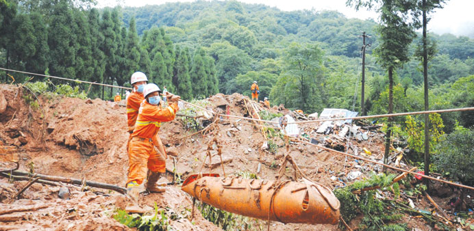 Rescuers work at the site of a massive landslide in Dujiangyan in southwest Chinau2019s Sichuan province yesterday.