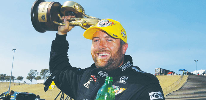 Qatar Al-Anabi Racing Top Fuel driver Shawn Langdon celebrates his fourth win of the season Sunday in Sonoma, California. PICTURE: Gary Nastase