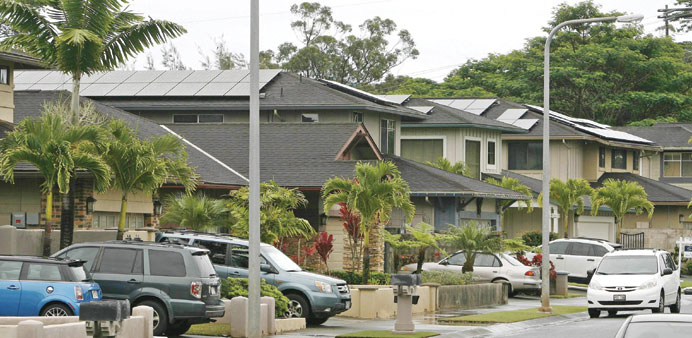 A view of houses with solar panels in the Mililani neighbourhood on the island of Oahu in Hawaii.