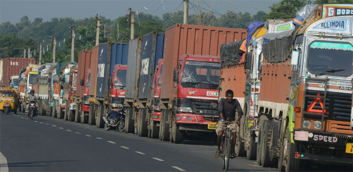 Indian trucks carrying goods to Nepal near the India-Nepal border at Panitanki