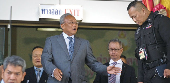 Suthep Thaugsuban, the leader of mass protests against the former Thai government which was toppled last month by an army coup, leaves the criminal co