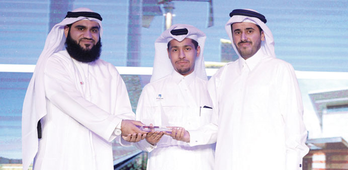 Ali bin Nasser al-Khalifa, CEO of ASTAD Project Management, receiving the award at Cityscape 2013.