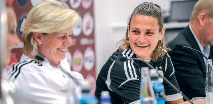 Germanyu2019s coach Siliva Neid (left) and goalie Nadine Anderer during a press conference in Stockholm, yesterday. (EPA)