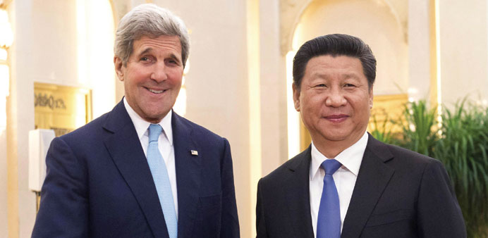 President Xi Jinping and US secretary of state John Kerry prior to their meeting at the Great Hall of the People in Beijing.