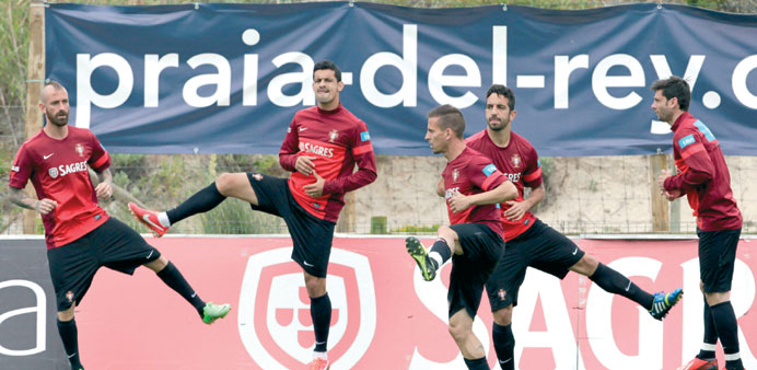 Portuguese national team players warm up during a training session in Obidos, Portugal, yesterday. (EPA)