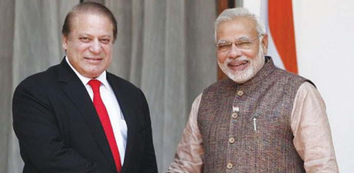 Pakistanu2019s Prime Minister Nawaz Sharif shakes hands with his Indian counterpart Narendra Modi before the start of their bilateral meeting in New Delhi