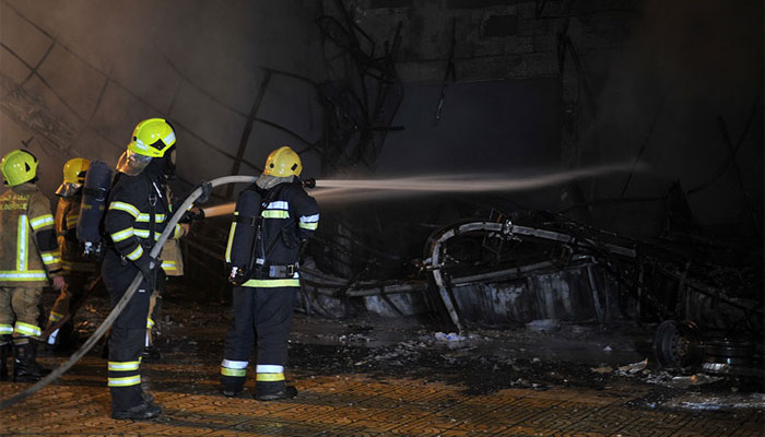 Firefighters douse the fire. Picture courtesy: Gulf News