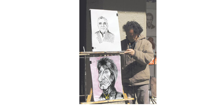 A street artist displays a portrait of Colombian Nobel Prize-winning author Gabriel Garcia Marquez in Bogota.