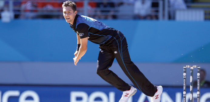 New Zealandu2019s fast bowler Trent Boult bowls during the Pool A Cricket World Cup match against Australia at Eden Park in Auckland. (AFP)