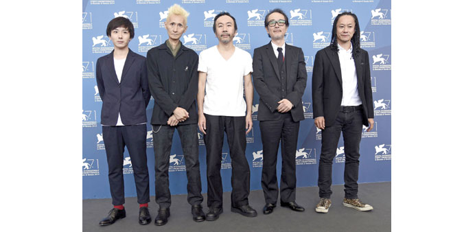 Actor Yusaku Mori (left), musician Chu Ishikawa, director Shinya Tsukamoto (centre), actors Lily Franky (second right) and Tatsuya Nakamura pose durin