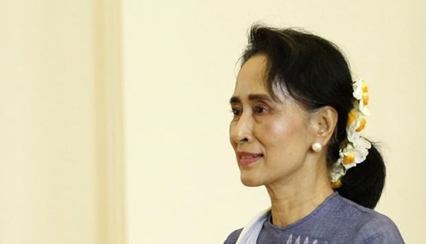 National League for Democracy party (NLD) leader Aung San Suu Kyi leaves after attending a lower house of parliament meeting at Naypyidaw on Friday.
