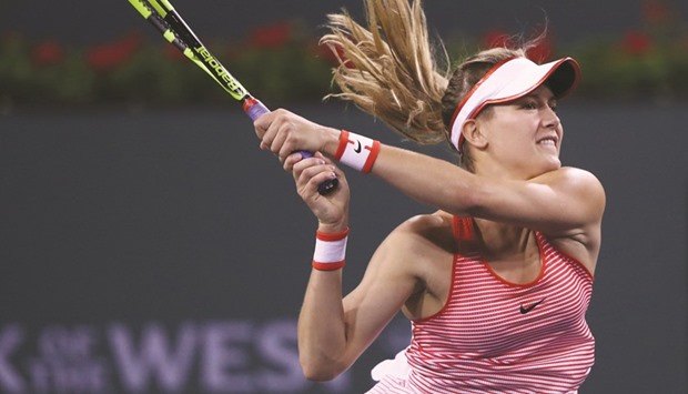 Eugenie Bouchard of Canada in action against Risa Ozaki of Japan during their BNP Paribas Open match in Indian Wells, California, on Thursday. (AFP)