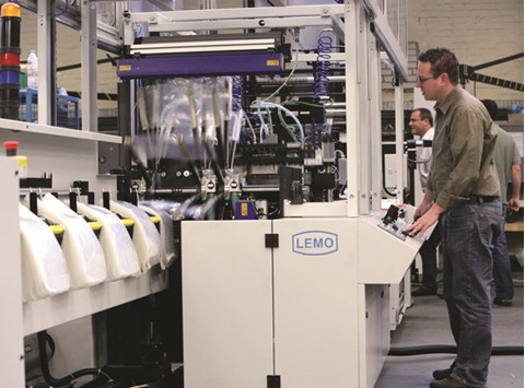 An employee operates a plastic-bag making machine at the Lemo bag manufacturing plant in Niederkassel, Germany. German manufacturing plunged to a 15-month low of 50.5 from Januaryu2019s 52.3, while activity in Britain, outside the eurozone, tumbled to 50.8, below all the forecasts in a Reuters poll of economists, from 52.9, Markitu2019s manufacturing PMI says.