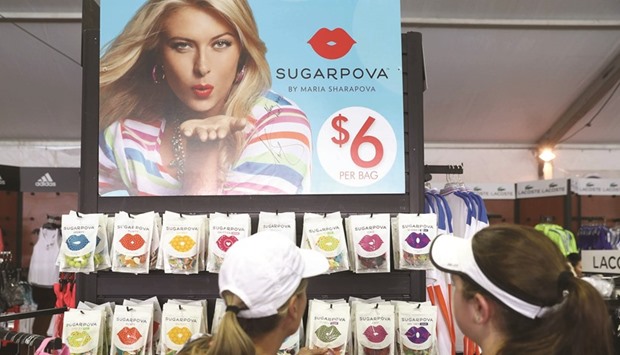 Maria Sharapovau2019s products called u2018sugarpovau2019 are seen for sale in the merchandise store during day four of the BNP Paribas Open at Indian Wells Tennis Garden in California (AFP)