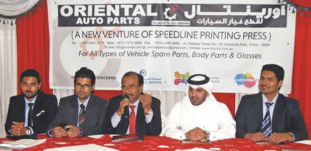 Officials of Oriental Auto Parts announcing the launch of the new showroom