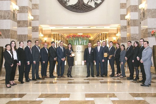 St Regis Doha staff with the awards.