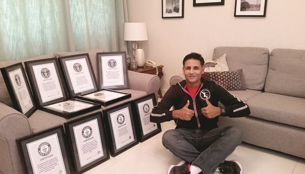 DISTINCTION: Ziyad Rahim with all his Guinness World Records certificates.