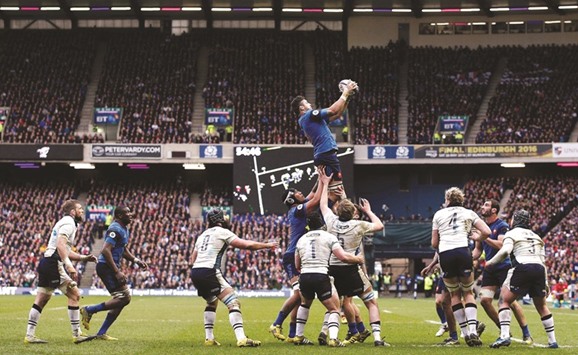 Franceu2019s Damien Chouly (centre) catches the ball in the line-out during the Six Nations international rugby union match against Scotland at Murrayfield in Edinburgh, Scotland yesterday. (AFP)