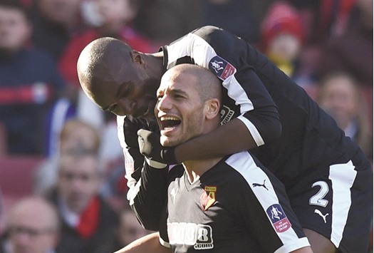 Adlene Guedioura celebrates scoring the second goal for Watford during their FA Cup quarter final against Arsenal.