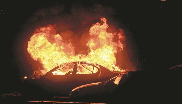 A vehicle burning after the explosion in Ankara yesterday.
