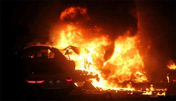 A burning car after a blast in Ankara
