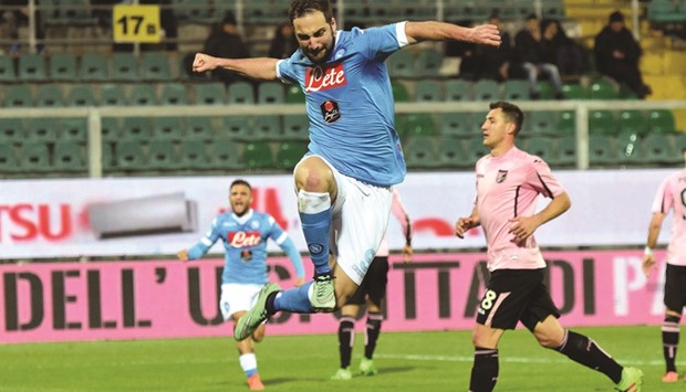 SSC Napoli Gonzalo Higuain (L) celebrates after scoring during the Serie A match aaginst Palermo.