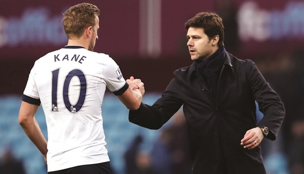 Tottenham manager Mauricio Pochettino with Harry Kane at the end of the game between Aston Villa andTottenham Hotspur at Villa Park.