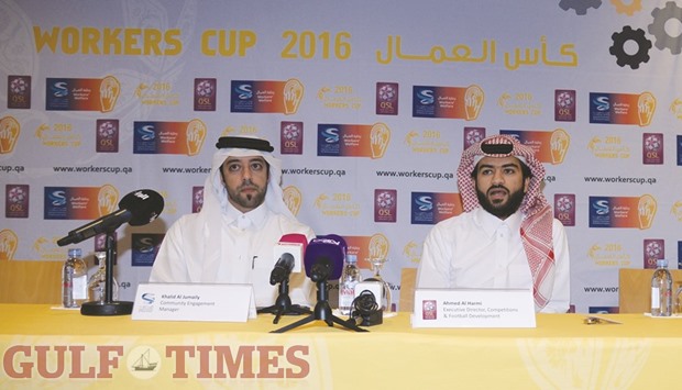 Qatar Stars League executive director of competitions Ahmed al-Arami (R) and Supreme Committee for Delivery & Legacy manager of community events Khalid al-Jumaily during the launch of the Fourth Workers Cup football tournament yesterday. PICTURES: Mamdouh