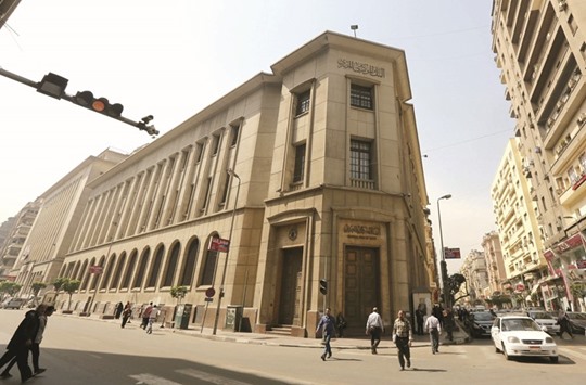The Central Bank of Egyptu2019s headquarters is seen in Cairo. The bank will offer $1.5bn today in its third special foreign exchange auction of the week, part of an effort to crush the currency black market and stabilise the Egyptian pound a day after a major devaluation.