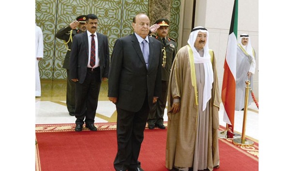 Kuwaiti Emir Sheikh Sabah al-Ahmad al-Jaber al-Sabah welcomes Yemeni President Abd-Rabbu Mansour Hadi at Kuwait international airport. Hadi is in Kuwait for a two-day official visit.
