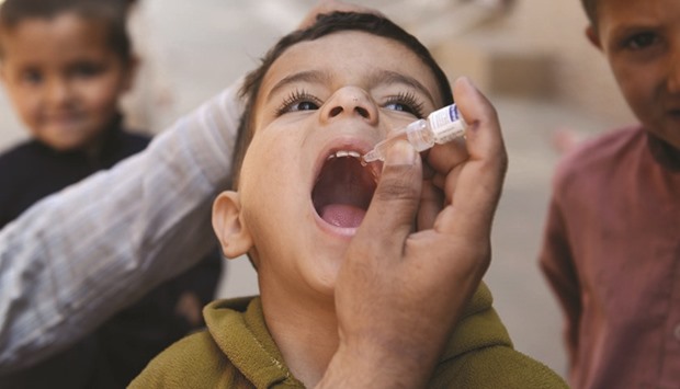 A Pakistani child receives polio vaccination drops. Polio is concentrated in the Federally Administered Tribal Areas in the northwest of the country.