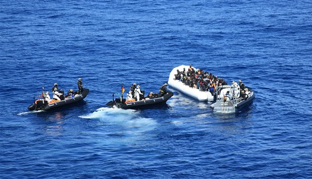 Dinghies of German Navy transporting some of the 615 rescued migrants back to Frankfurt-am-Main supply ship operating with the Maritime Rescue Coordination Centre Rome, MRCC off the Libyan coast.