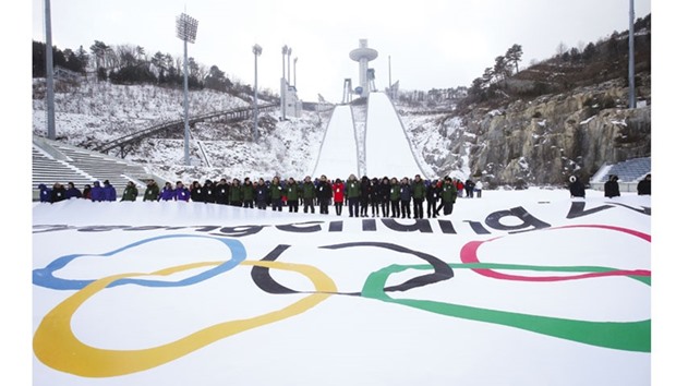 In this file photograph dated February 9, 2015, participants are seen attending an event marking the three-year countdown to the start of the 2018 Winter Olympics, at the Alpensia Ski Jumping Centre in Pyeongchang, South Korea