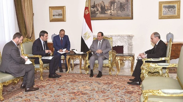 Egyptu2019s President Abdel Fattah al-Sisi attends an interview with reporters of Italyu2019s La Repubblica newspaper (left) at the Ittihadiya presidential palace in Cairo yesterday. Egypt will spare no effort to find and punish those who tortured and killed Italian student Giulio Regeni in Cairo, Sisi said an interview published yesterday.